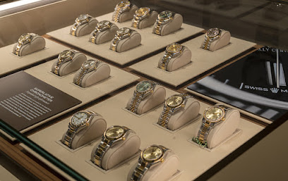 محمد رسول خوري وأولاده - روليكس بوتيك ، غاليريا مول - أم القيوين - +971 2 546 2200