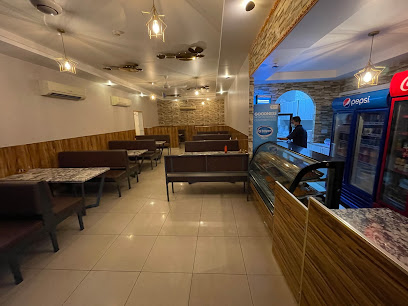 مطعم القوبين (بنجابي دابا) - الشارقة - +971 55 477 9411