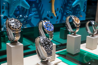 محمد رسول خوري وأولاده - روليكس بوتيك ، ياس مول - أم القيوين - +971 2 565 0586