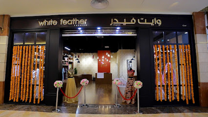 أزياء الريش الأبيض - أم القيوين - +971 50 672 0980