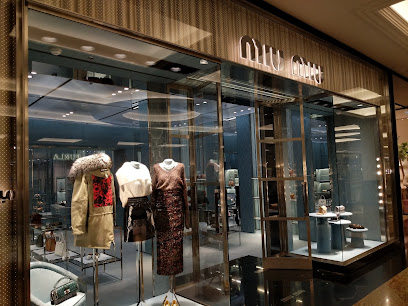 ميو ميو دبي مول ليفل شو ديستريكت - الشارقة - +971 4 501 6605